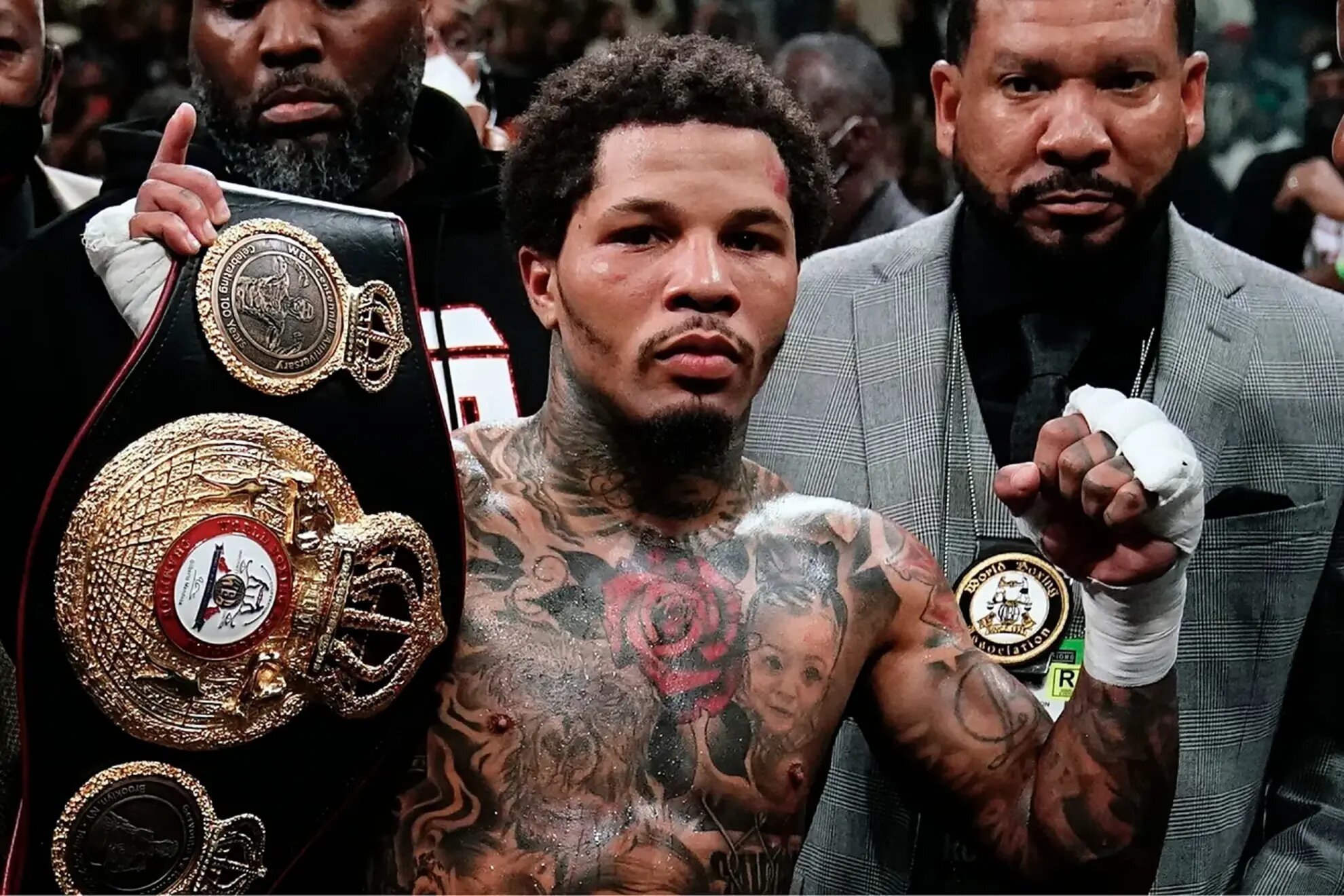 Gervonta Davis holding his title belt.