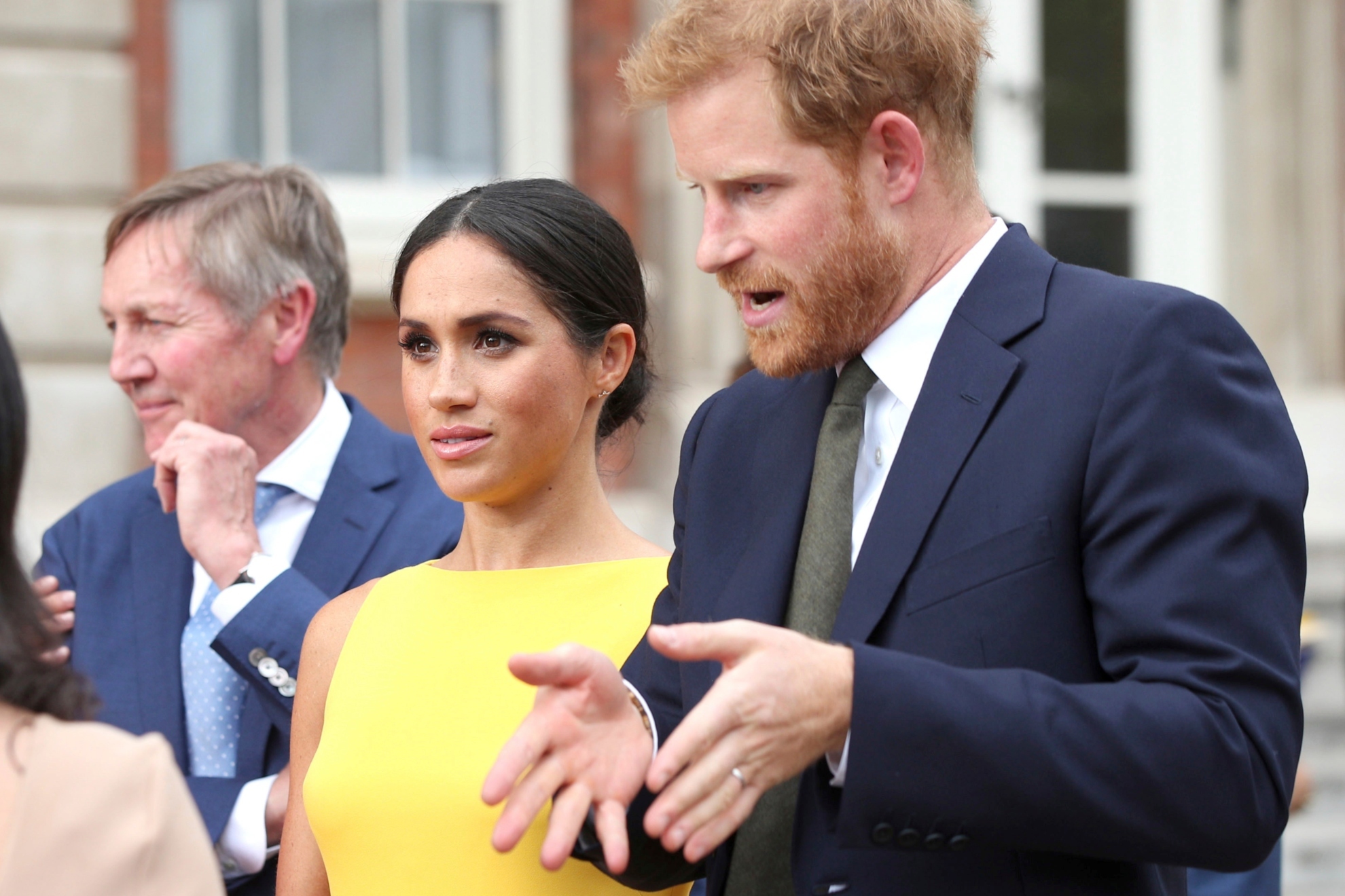 Britains Prince Harry, the Duke of Sussex, right and Meghan, the Duchess of Sussex attend the Your Commonwealth Youth Challenge reception