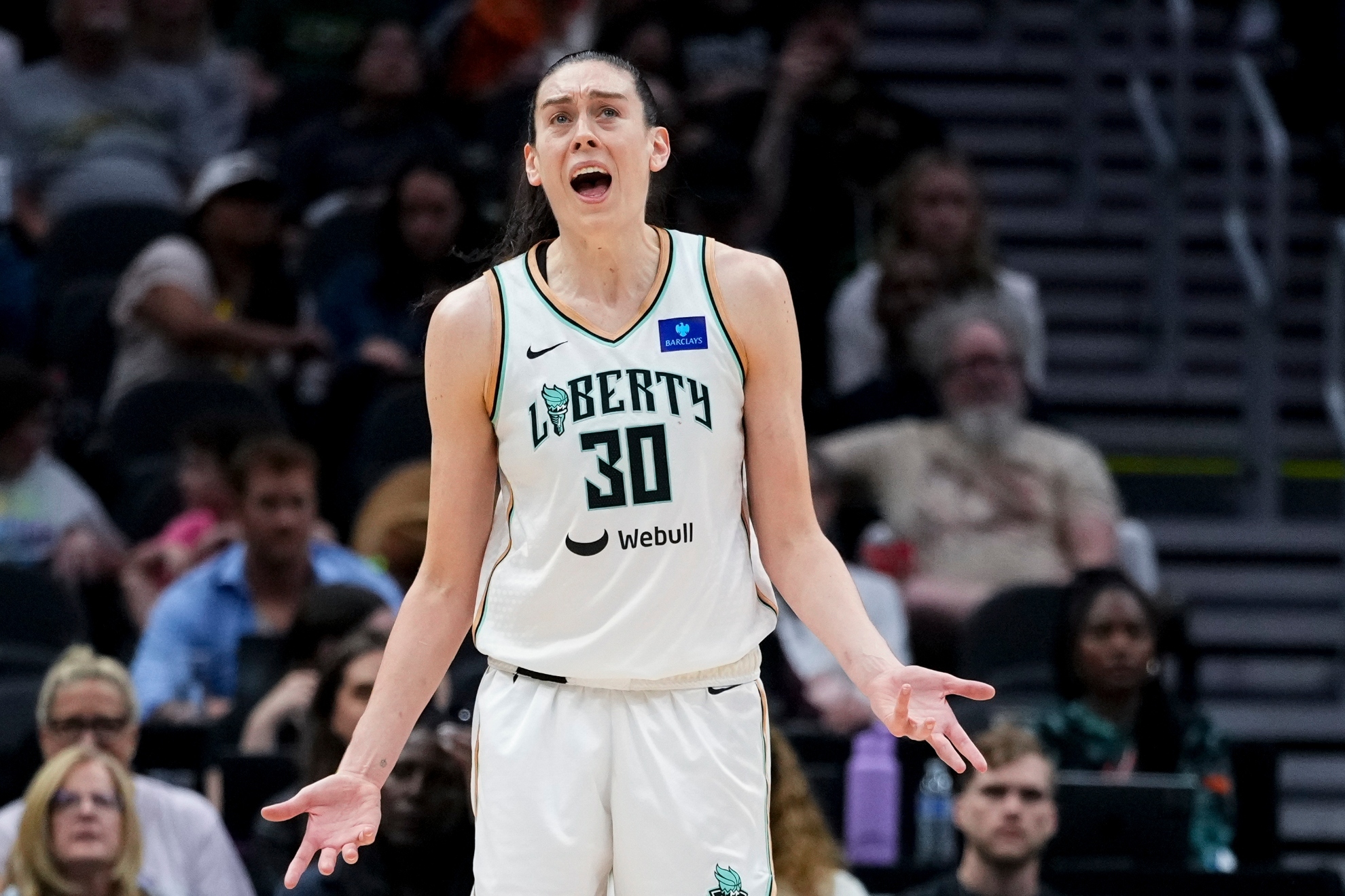 New York Liberty forward Breanna Stewart reacts during the second half of a WNBA basketball game against the Seattle Storm, Friday, Aug. 30, 2024, in Seattle. The Liberty won 98-85.